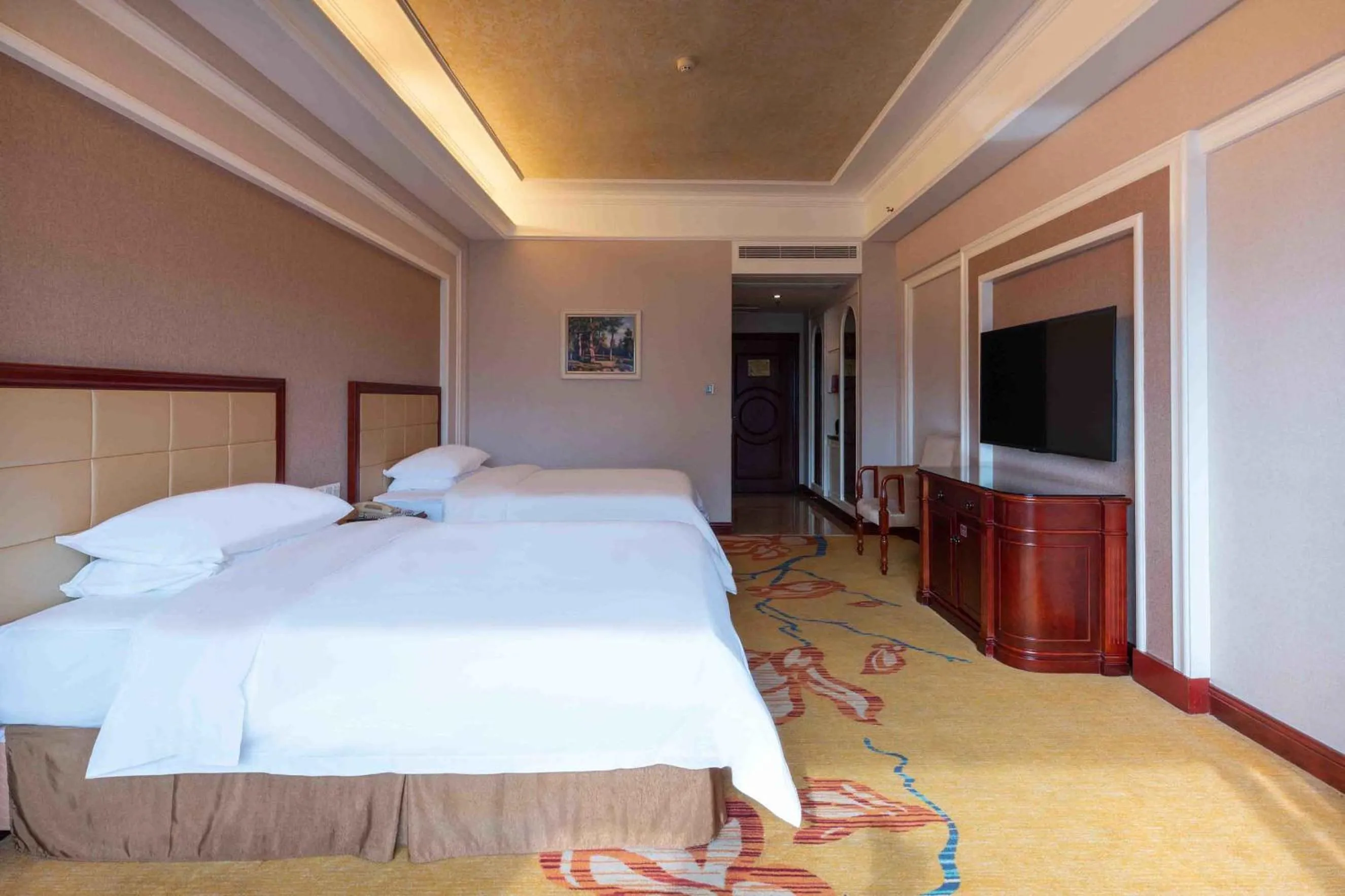 Bed in Vienna Hotel Shenzhen Songgang Liye Road