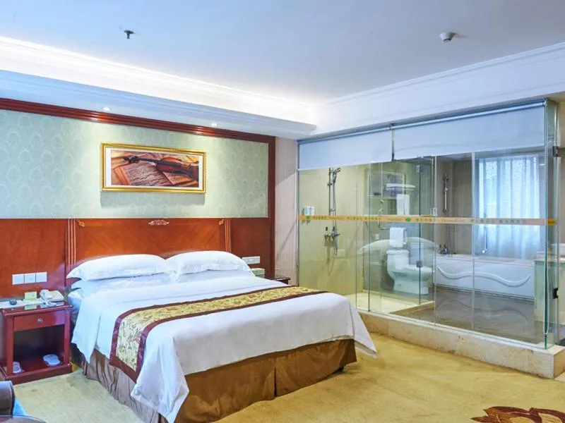 Bed in Vienna Hotel Shenzhen Shajing Shangnan