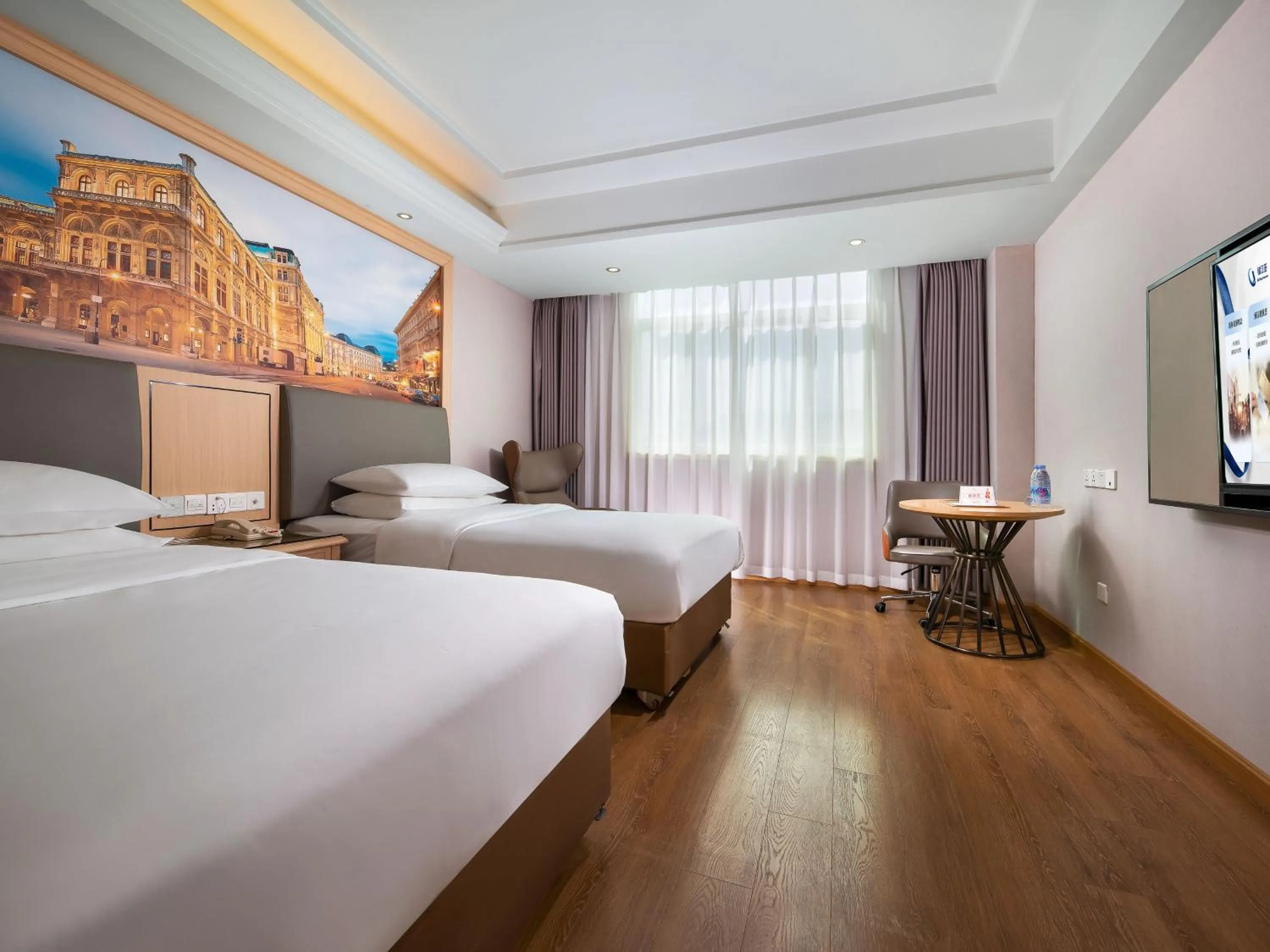 Photo of the whole room, Bed in Vienna Hotel Shenzhen Henggang Cuihu Shangzhuang