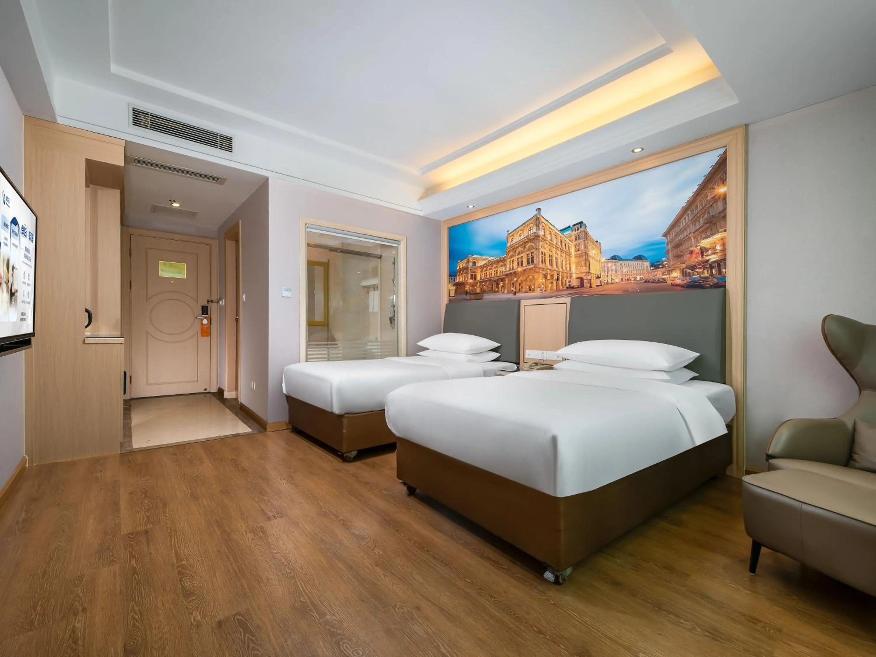 Bed in Vienna Hotel Shenzhen Henggang Cuihu Shangzhuang