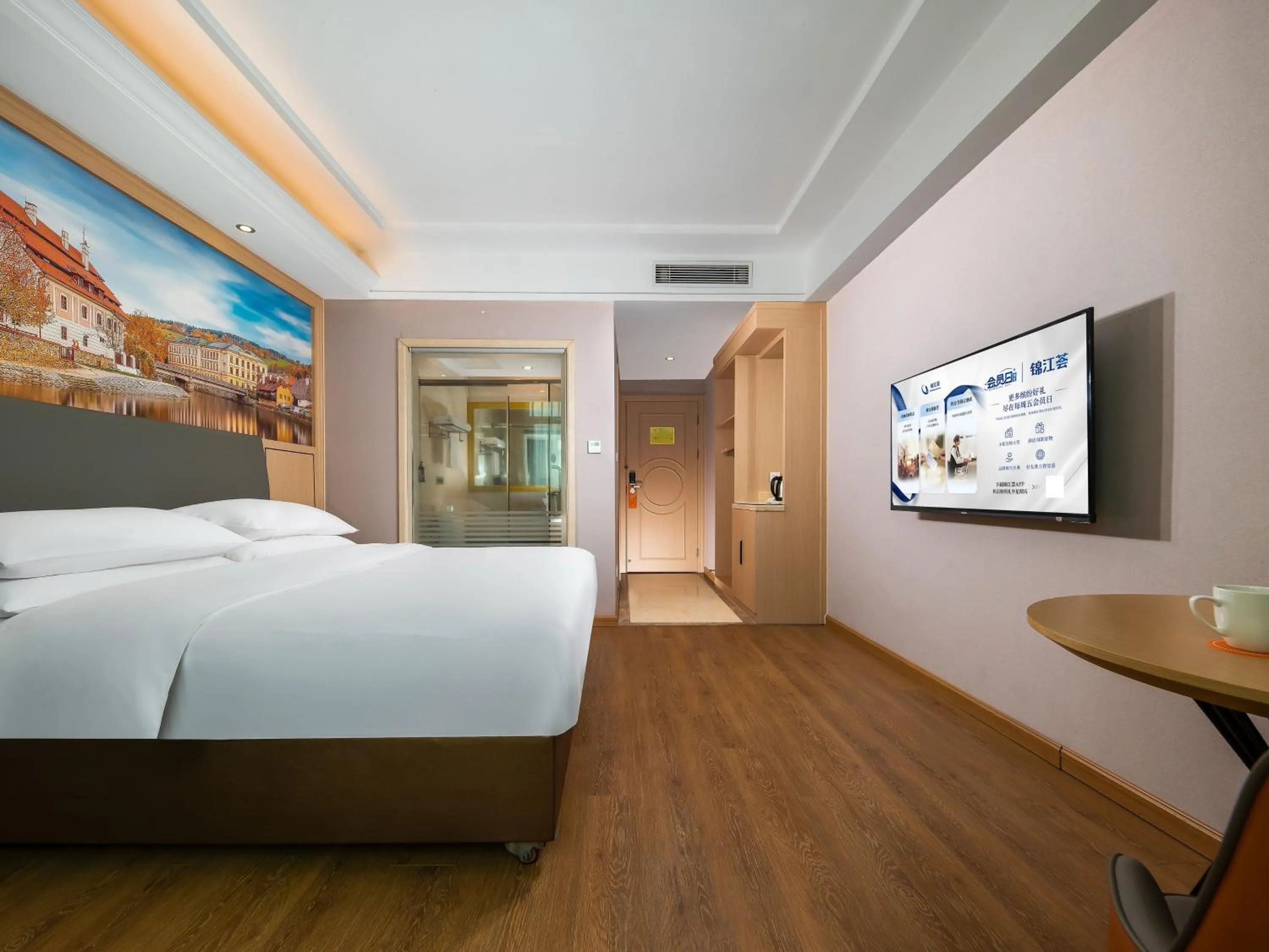 Bed in Vienna Hotel Shenzhen Henggang Cuihu Shangzhuang