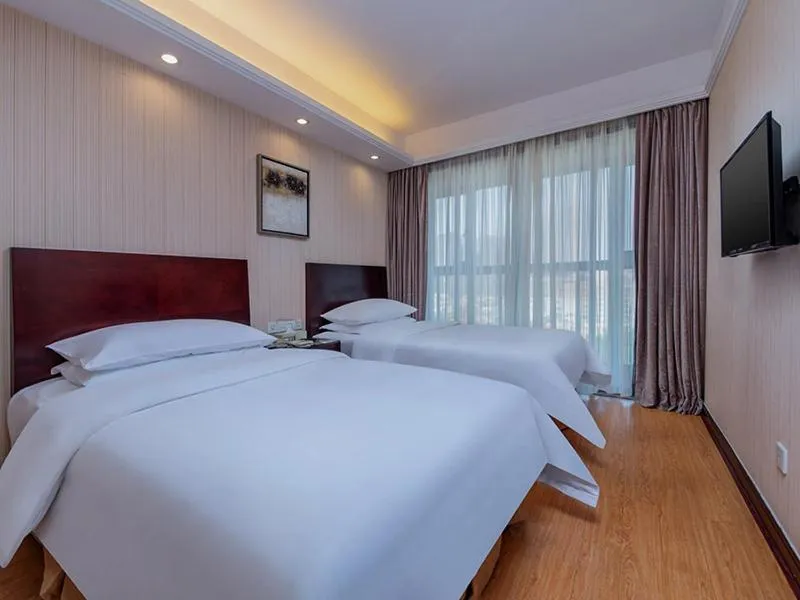 Bed in Vienna Hotel Shenzhen Henggang New City