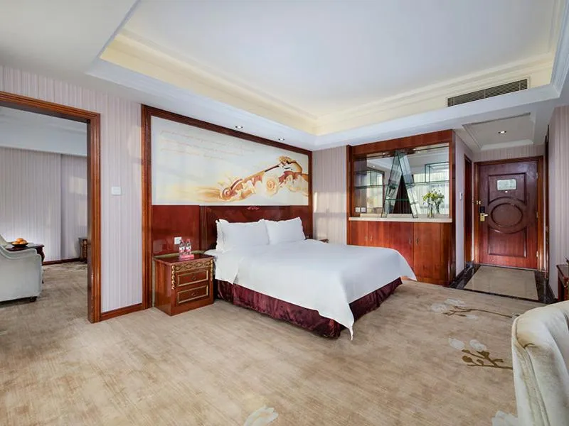 Bed in Vienna Hotel Shenzhen Pingshan Highway Station