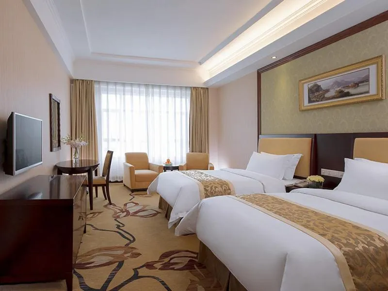 Bed in Vienna Hotel Dongguan Changping Avenue