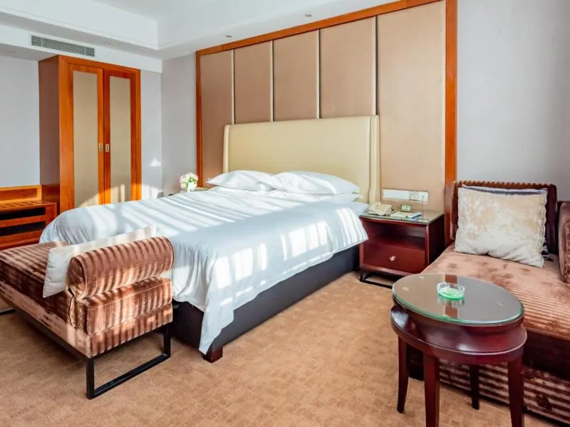 Bed in Vienna Hotel Dongguan Tangxia Binfen Plaza