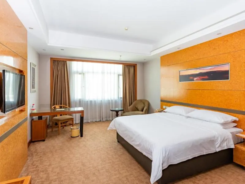 Bed in Vienna Hotel Dongguan Tangxia Binfen Plaza