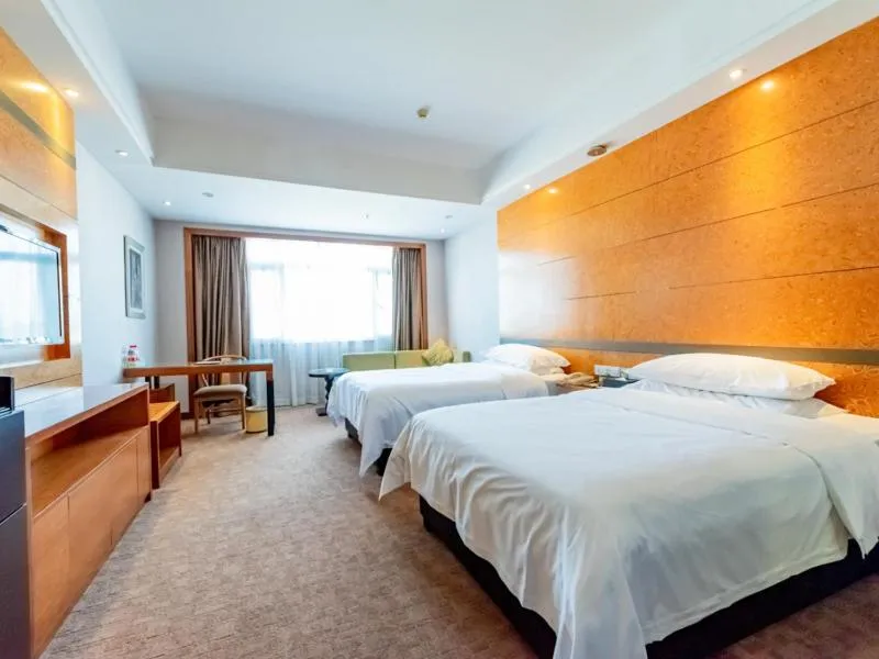 Bed in Vienna Hotel Dongguan Tangxia Binfen Plaza
