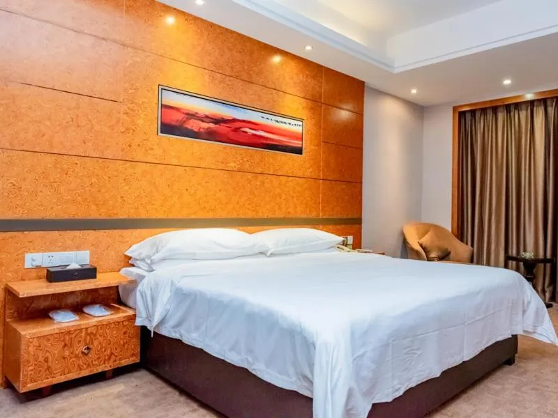 Bed in Vienna Hotel Dongguan Tangxia Binfen Plaza