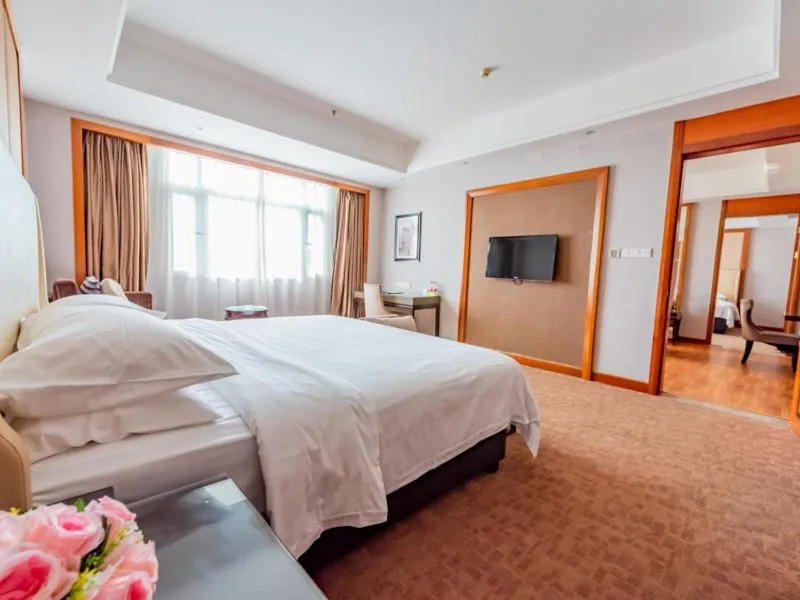 Bed in Vienna Hotel Dongguan Tangxia Binfen Plaza