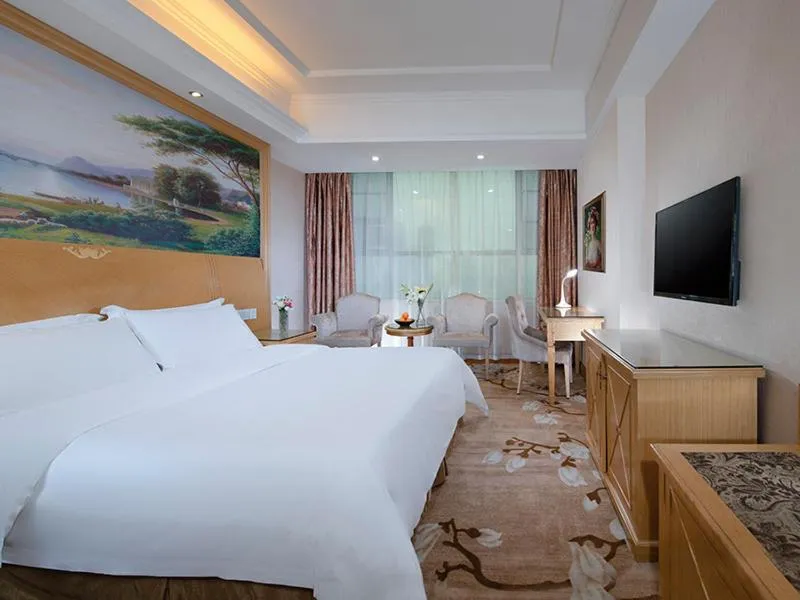 Bed in Vienna Hotel Dongguan Tangxia Lincun Square