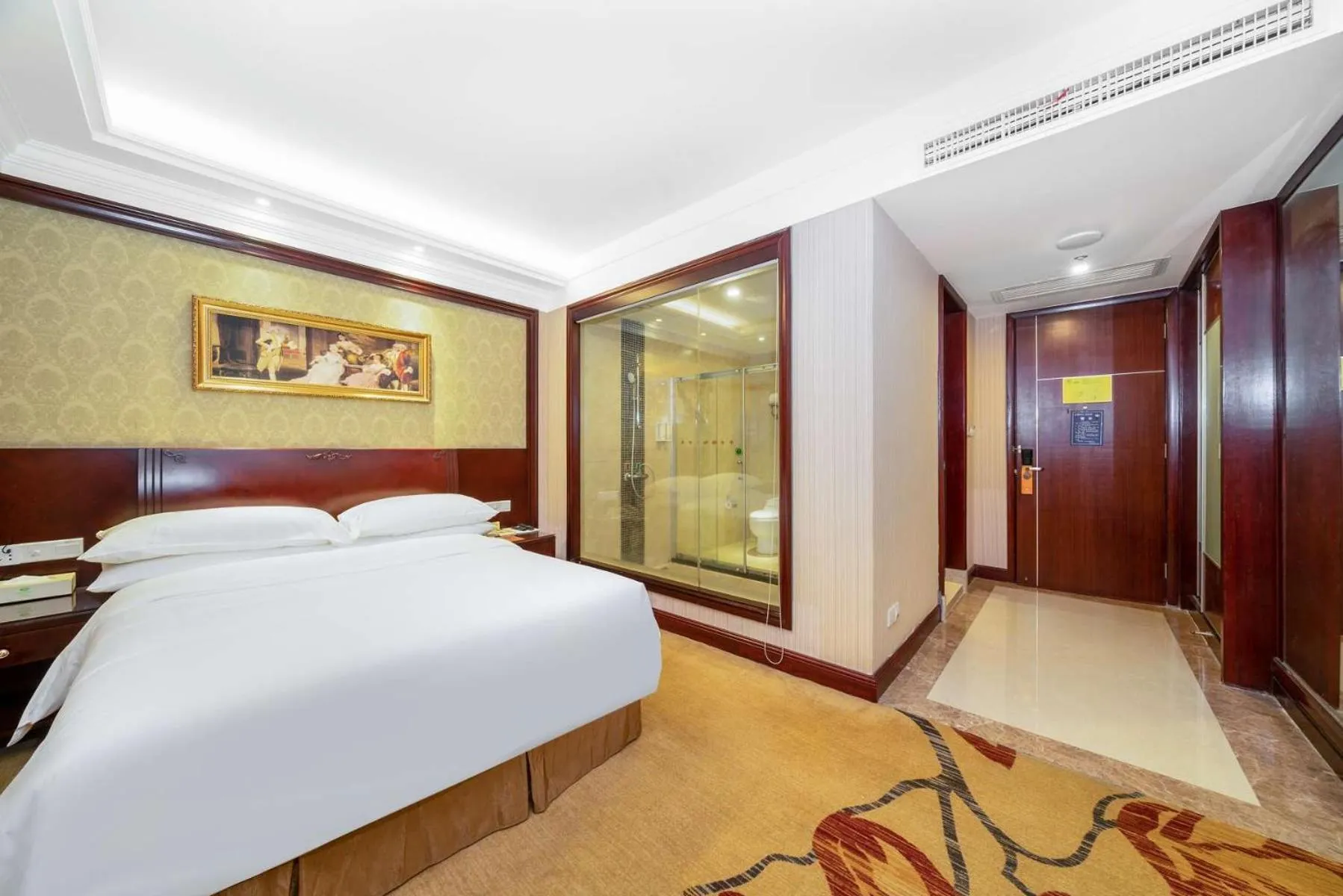 Bed in Vienna Hotel Dongguan Houjie Exhibition Center