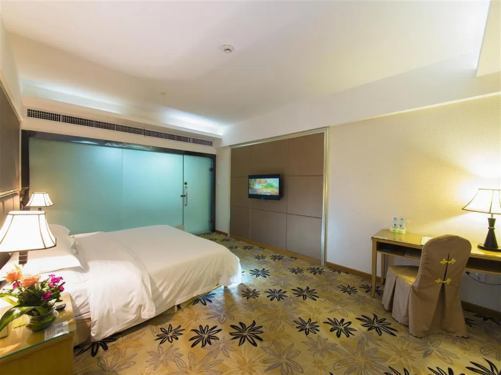 Bed in Vienna Hotel Zhanjiang Coast Avenue
