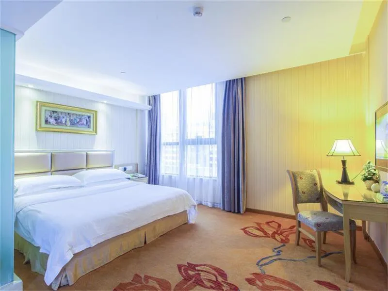 Bed in Vienna Hotel Zhanjiang Coast Avenue