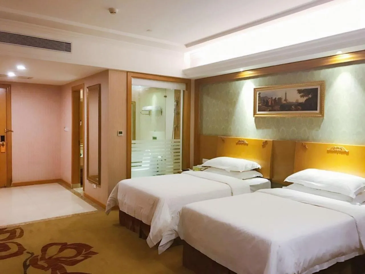 Bed in Vienna Hotel Foshan Nanzhuang Avenue