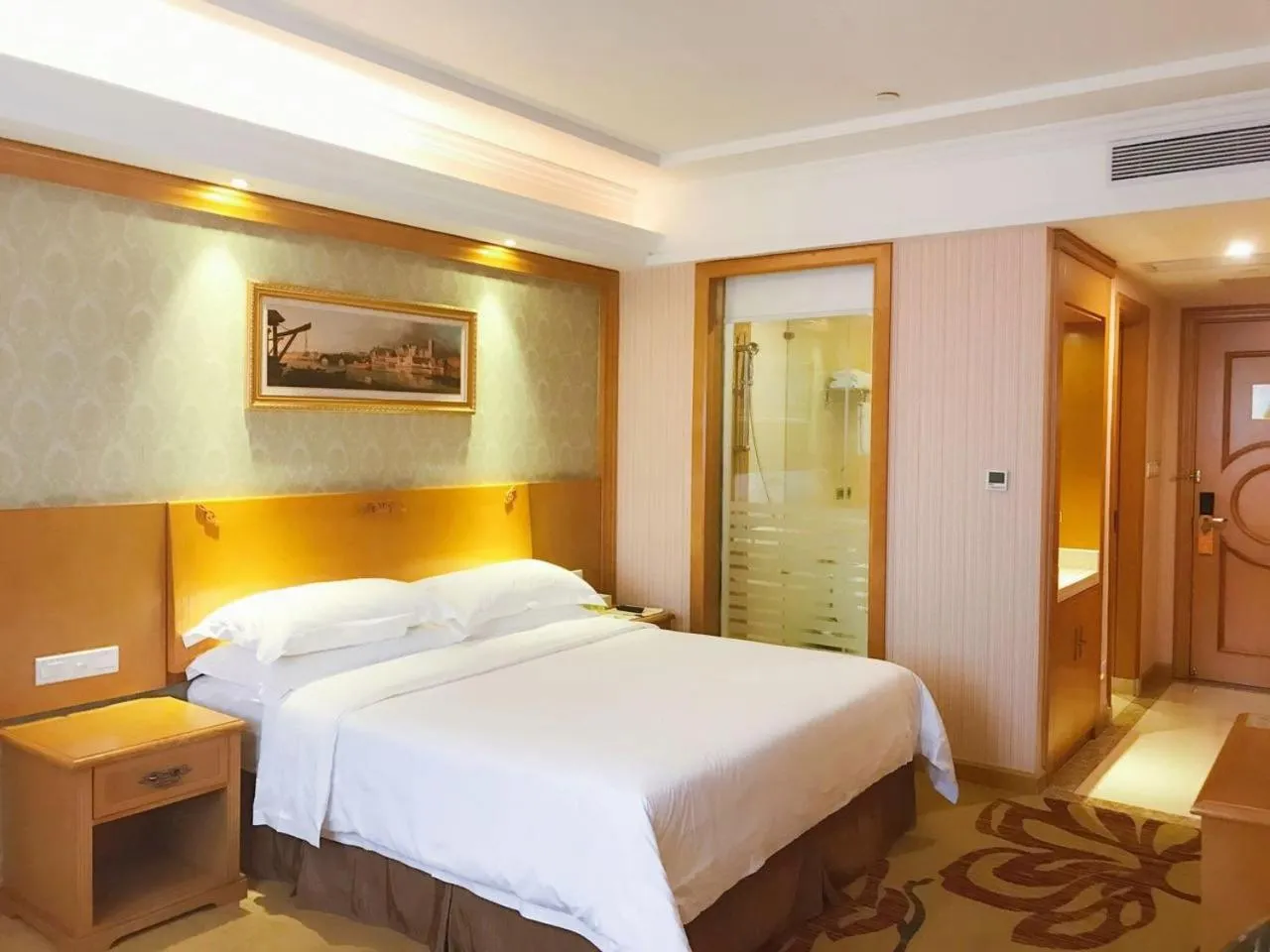 Bed in Vienna Hotel Foshan Nanzhuang Avenue