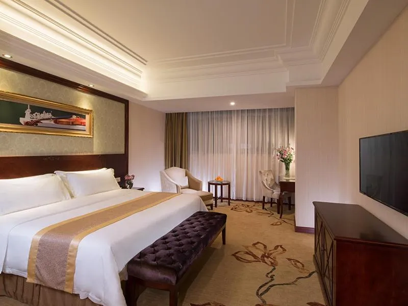 Bed in Vienna International Hotel Zhongshan Shiqi Kanghua Road