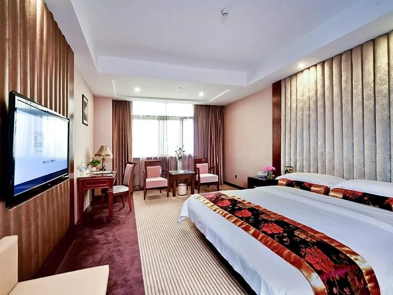 Bed in Vienna Hotel Nanning Jiangnan Wanda