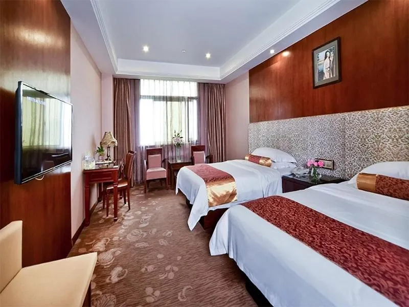 Bed in Vienna Hotel Nanning Jiangnan Wanda