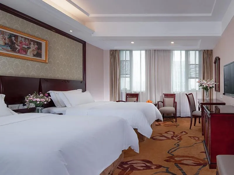 Bed in Vienna Hotel Guiyang Exhibition Center