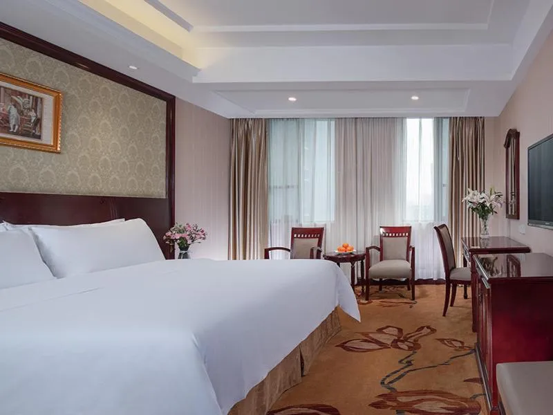 Bed in Vienna Hotel Guiyang Exhibition Center