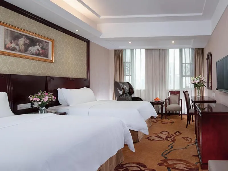 Bed in Vienna Hotel Guiyang Exhibition Center