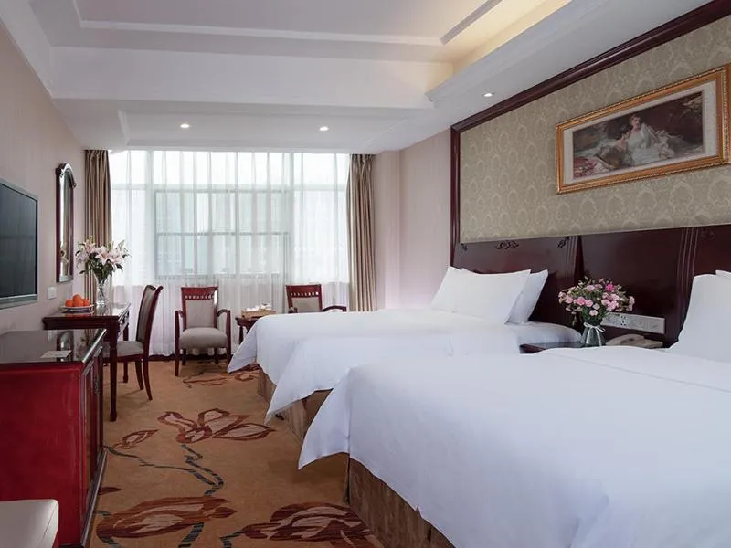 Bed in Vienna Hotel Guiyang Exhibition Center