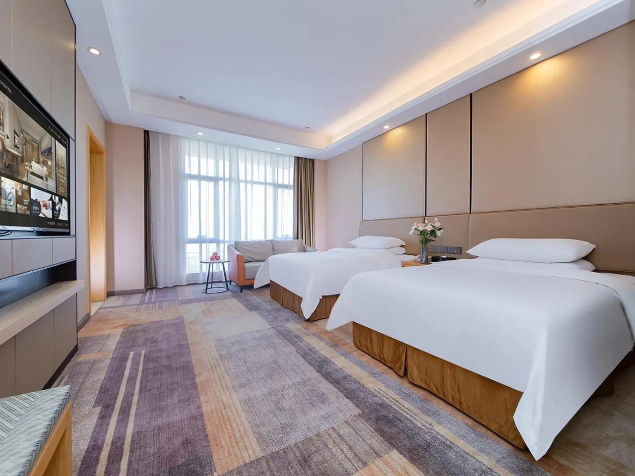 Bed in Vienna International Hotel Jingzhou New World