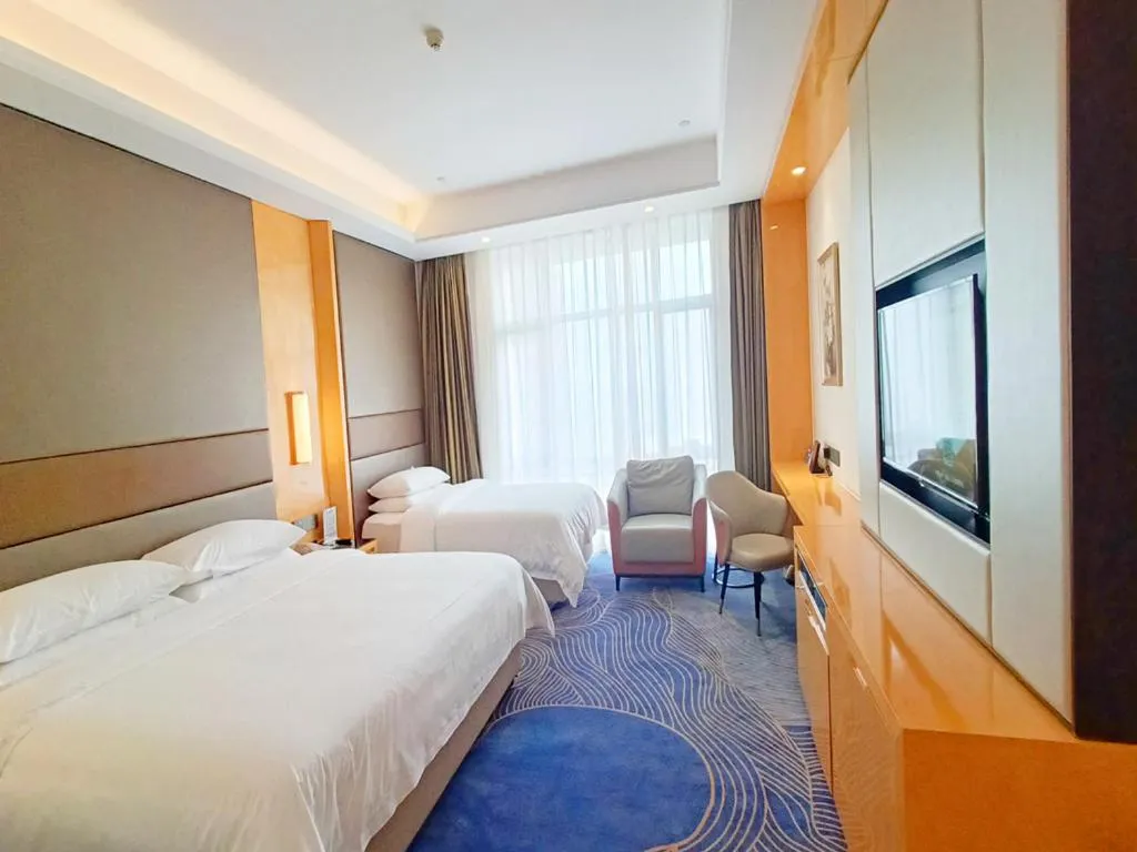 Bed in Vienna International Hotel Jingzhou New World