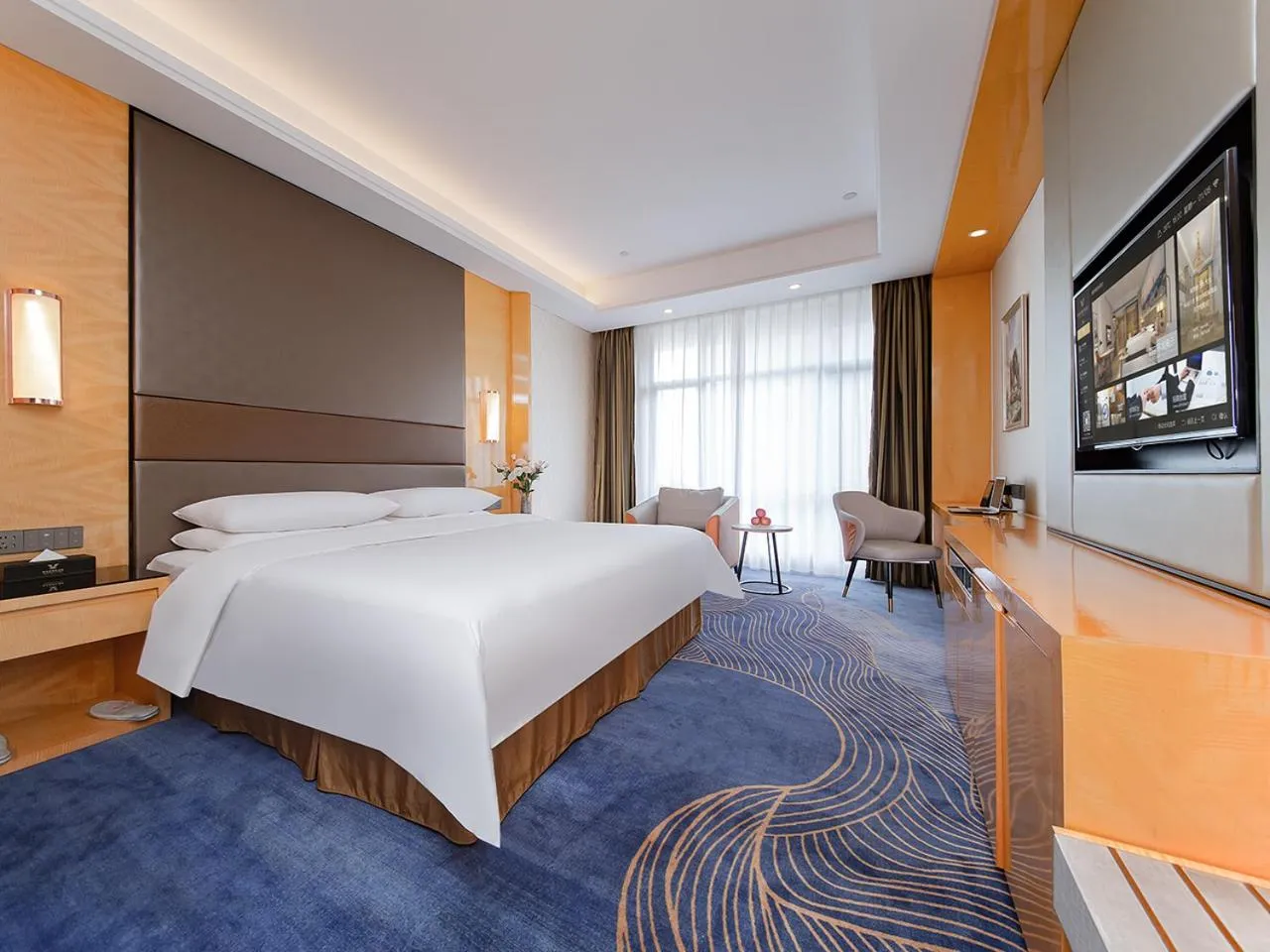Bed in Vienna International Hotel Jingzhou New World