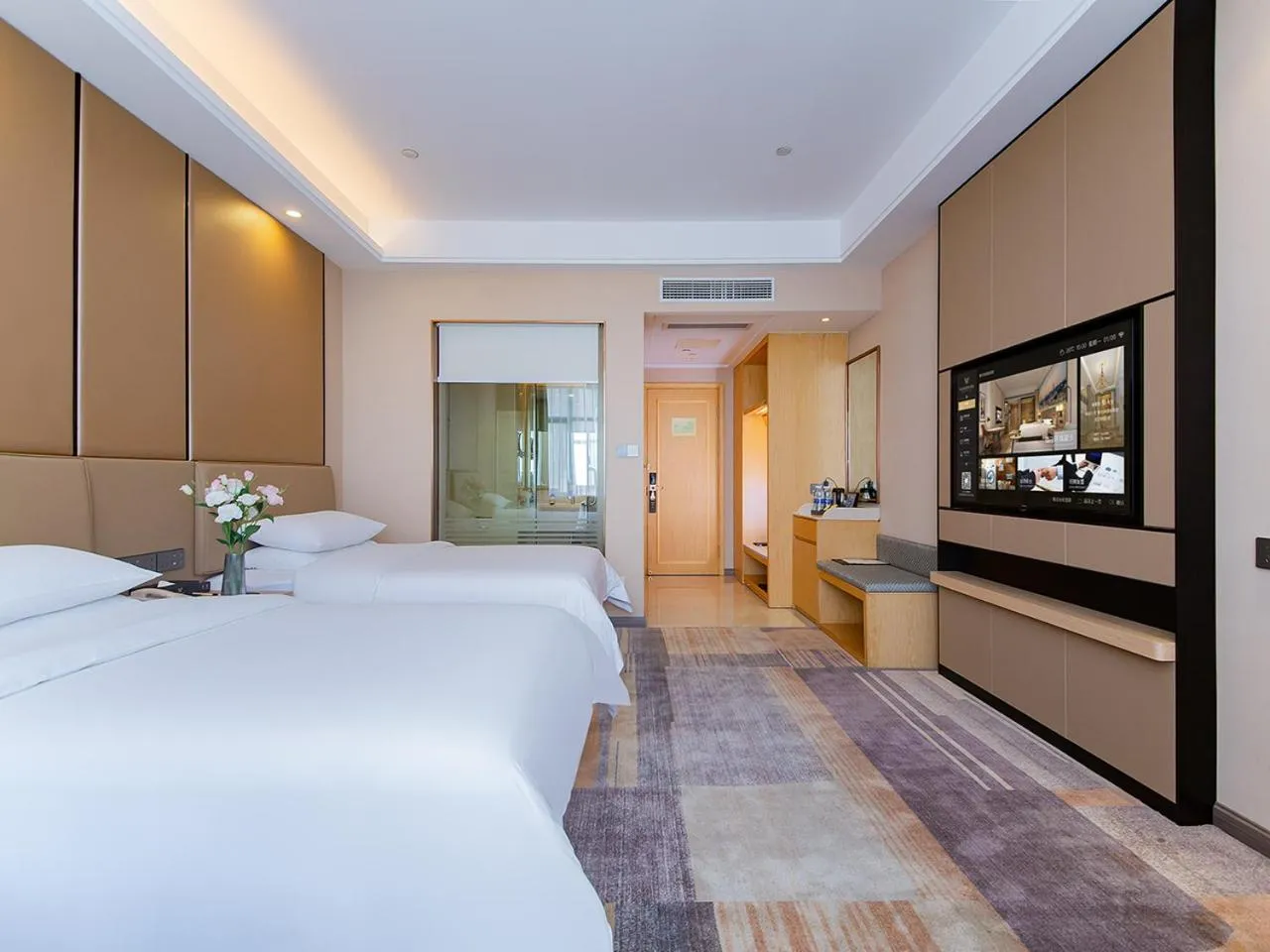 Bed in Vienna International Hotel Jingzhou New World