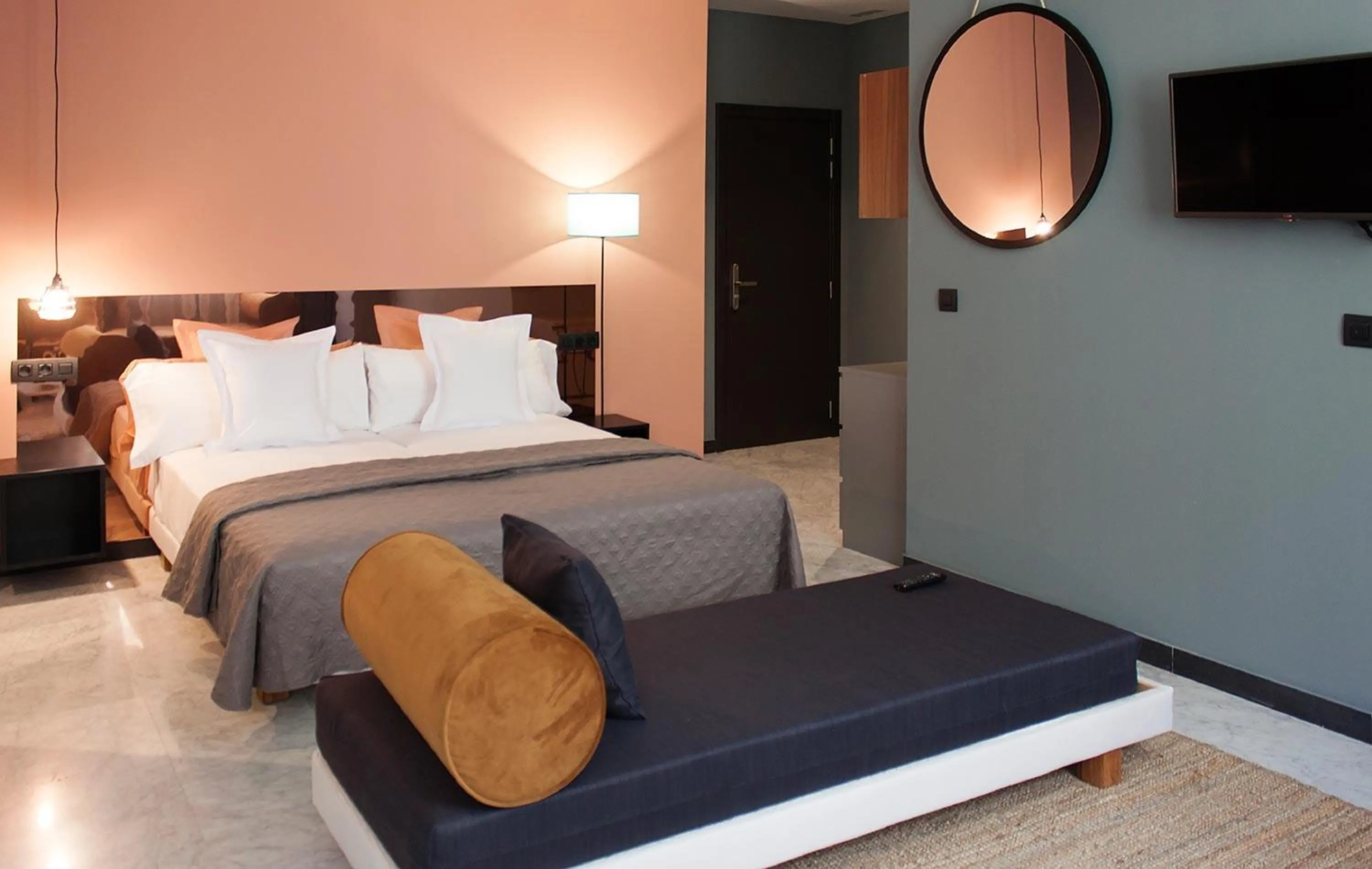 Bedroom, Bed in Apartamentos NONO by Charming Stay
