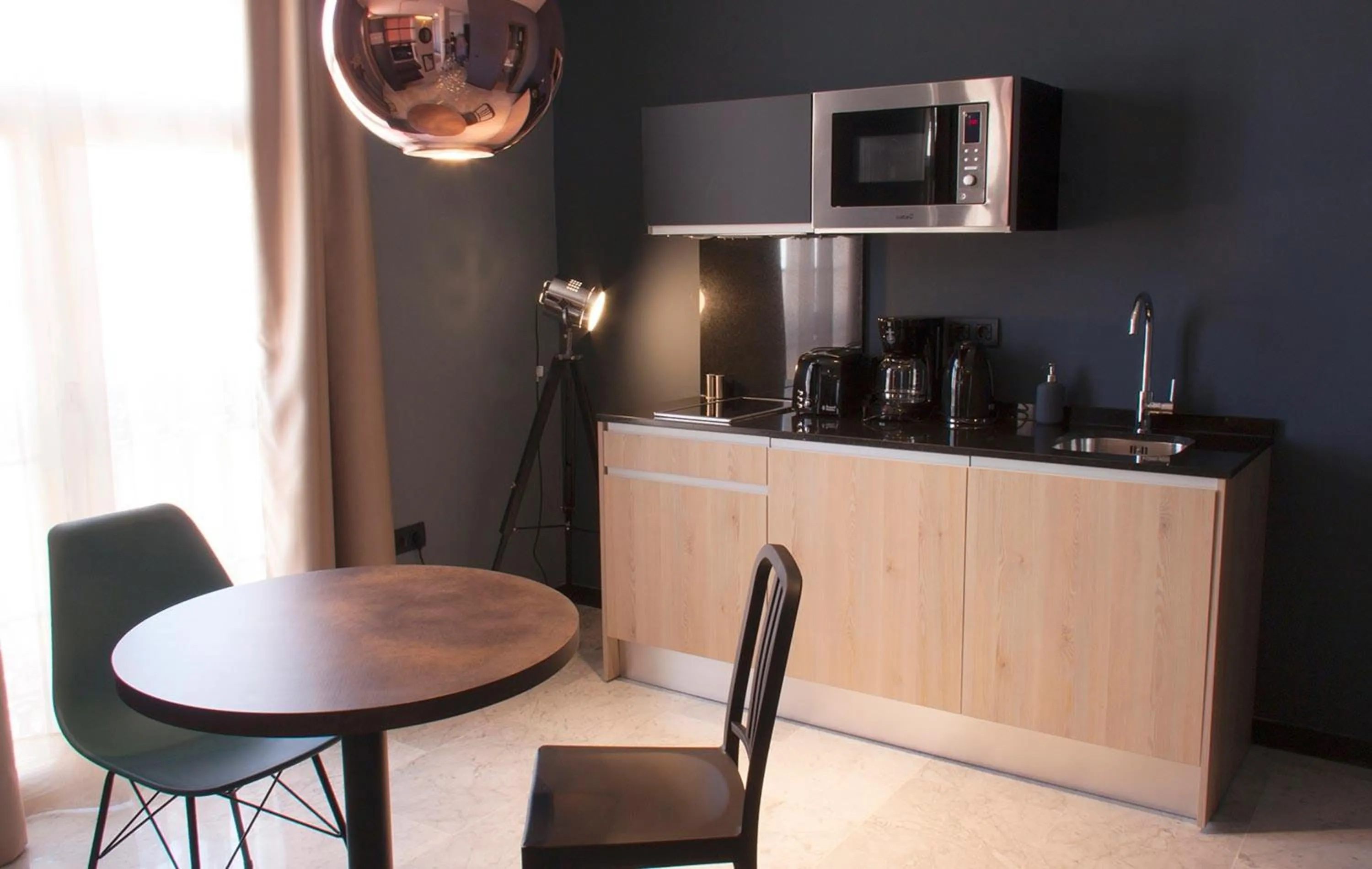 Kitchen or kitchenette in Apartamentos NONO by Charming Stay