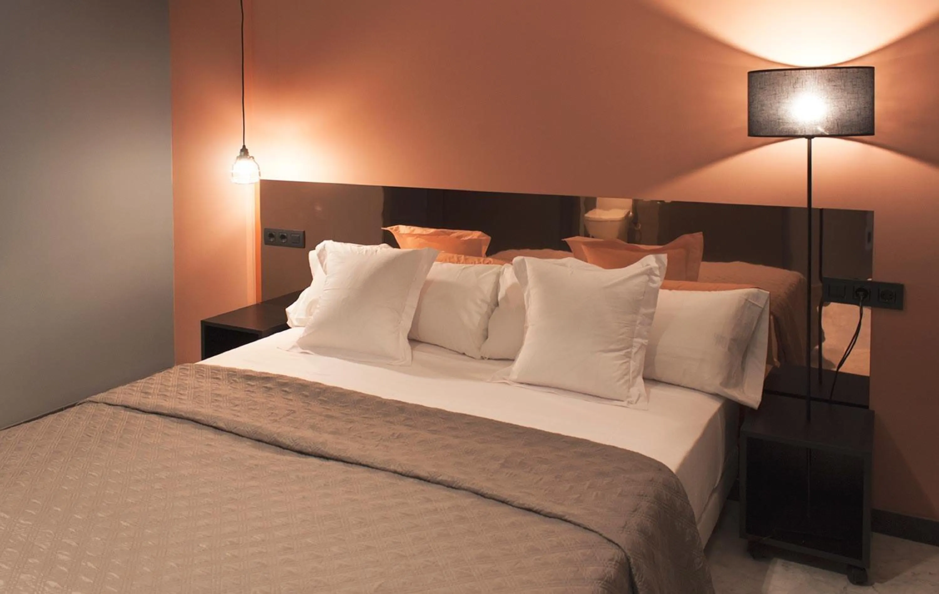 Bedroom, Bed in Apartamentos NONO by Charming Stay