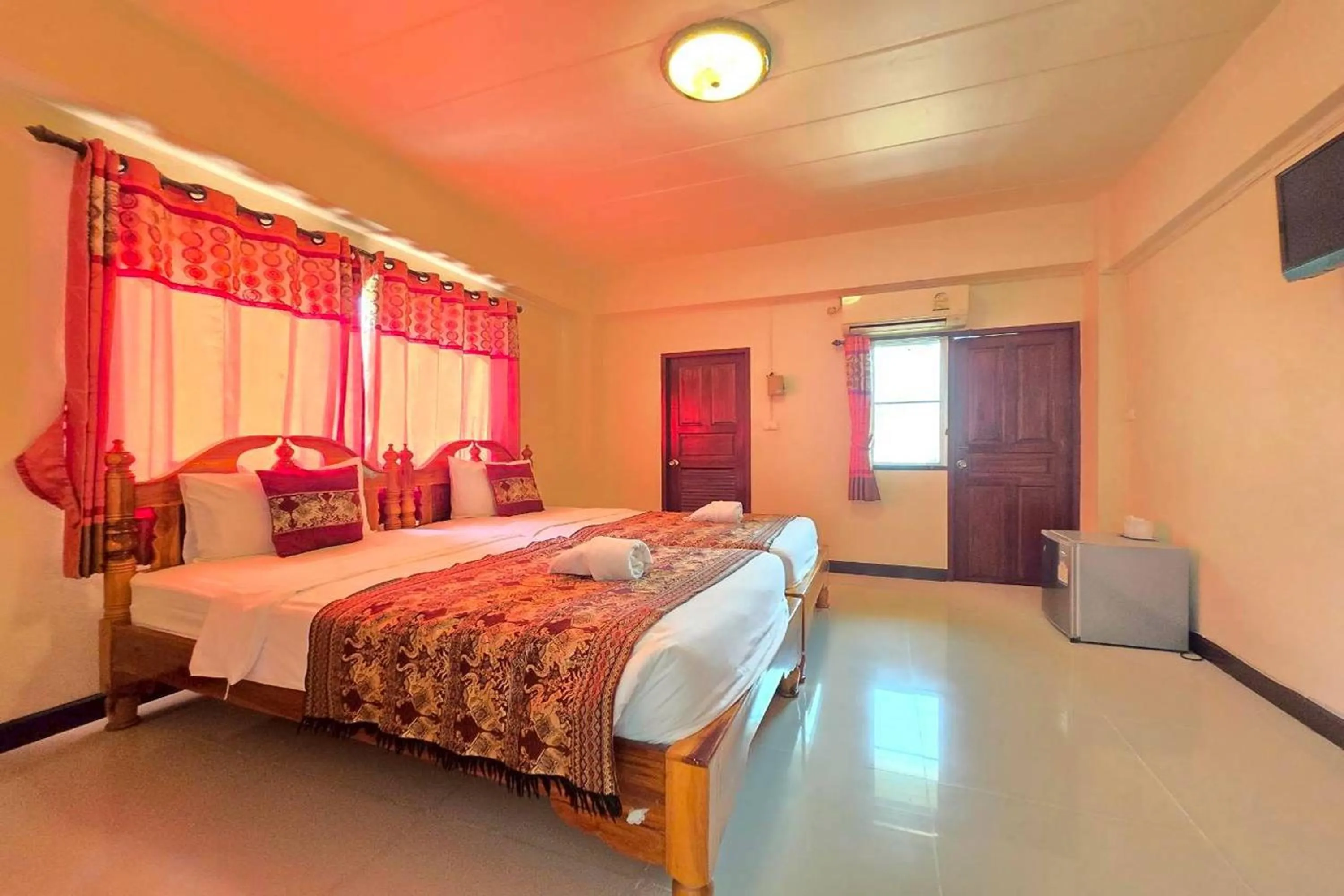 Bed in Baan Sabai Guesthouse