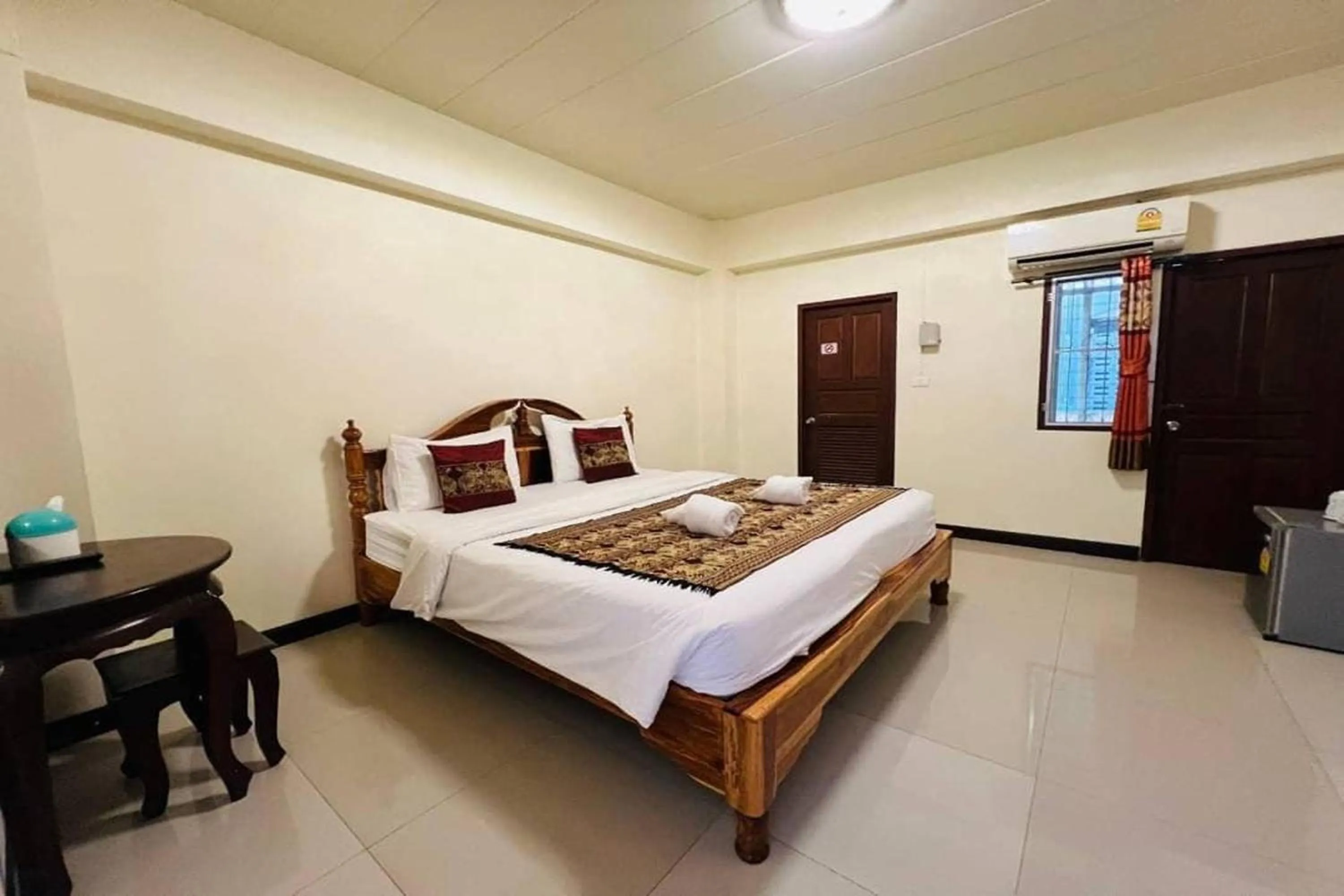 Bed in Baan Sabai Guesthouse