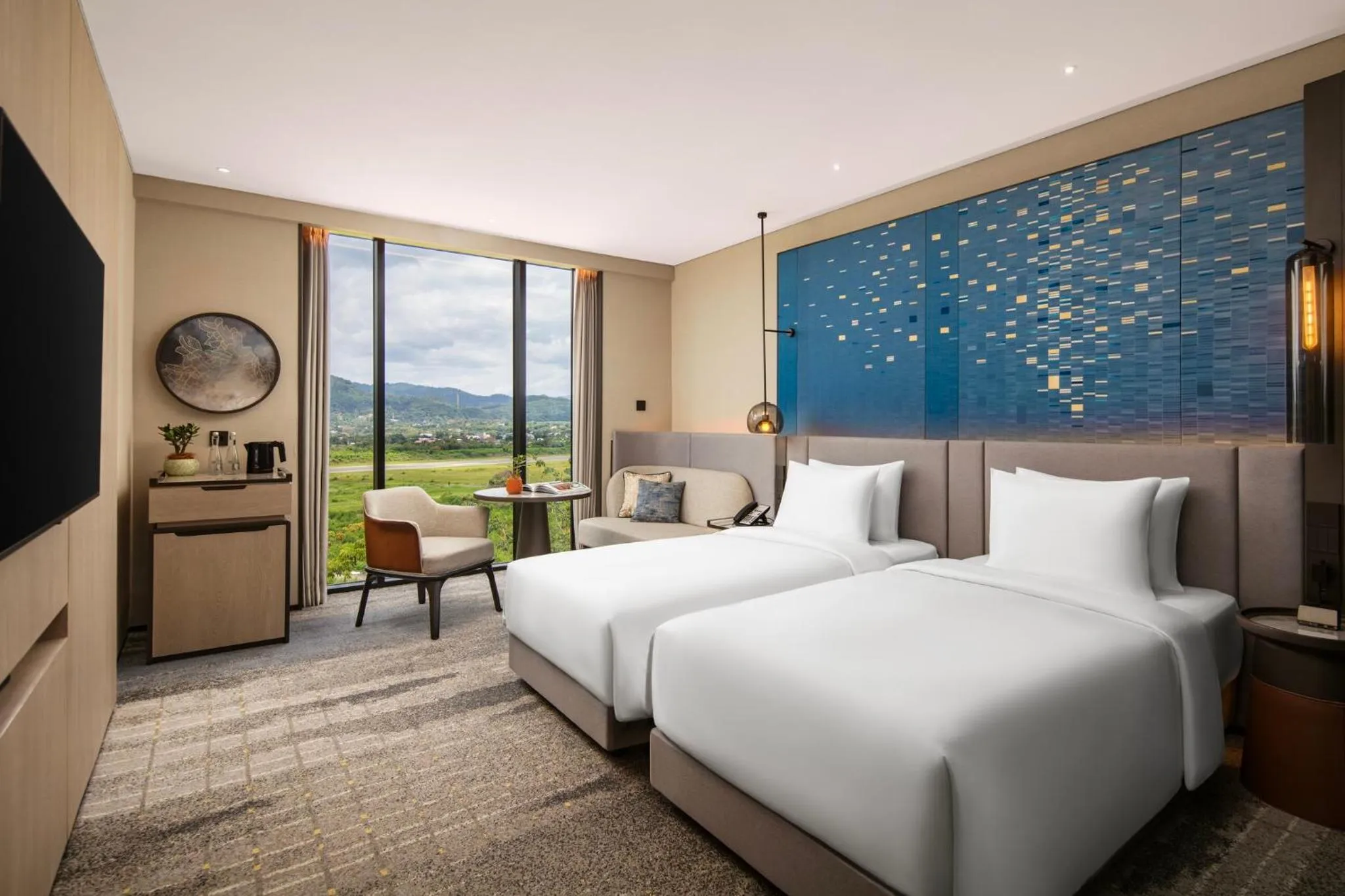 Photo of the whole room, Bed in Crowne Plaza Labuan Bajo by IHG