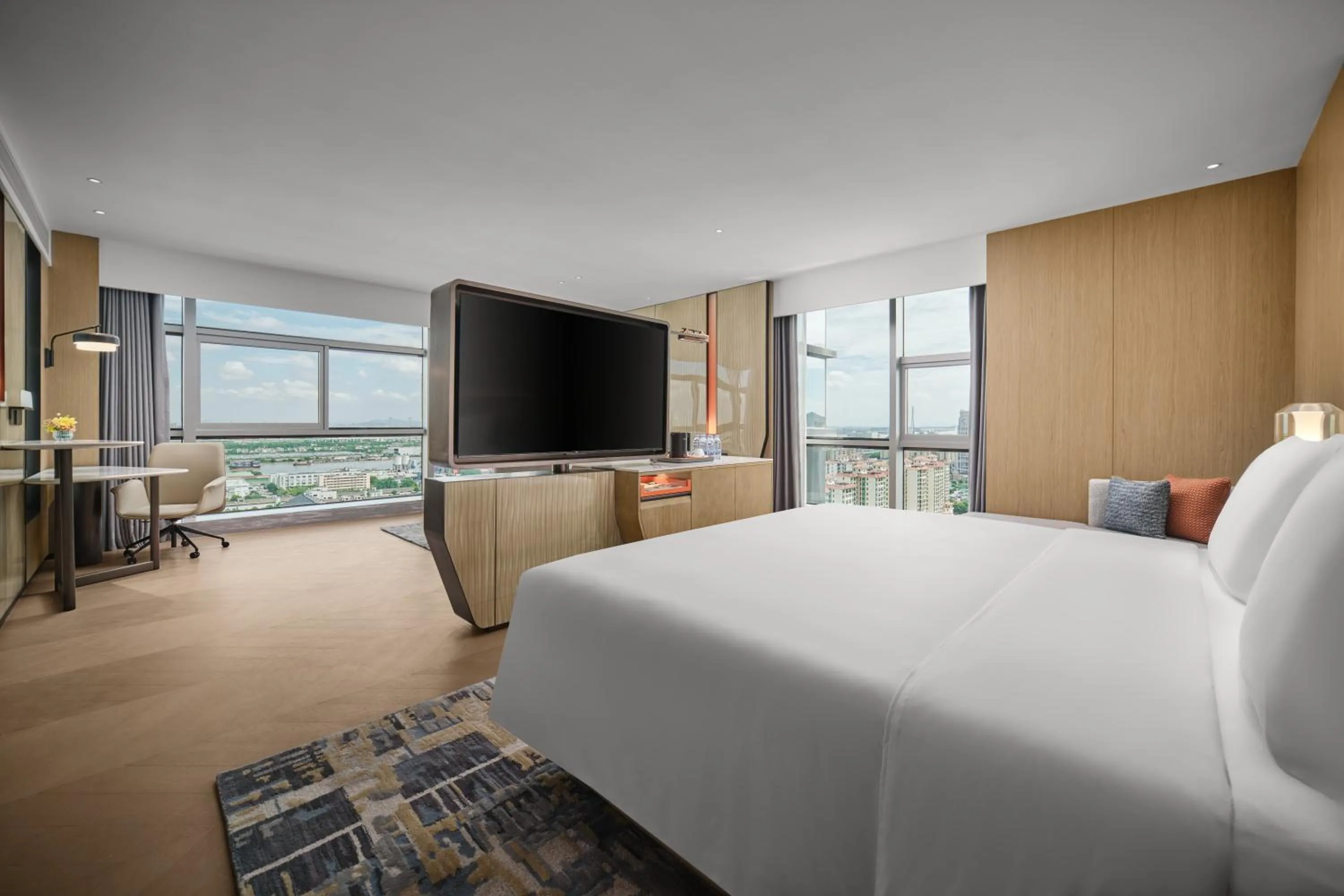 Communal lounge/ TV room in Crowne Plaza Zhongshan Torch High-tech Zone by IHG