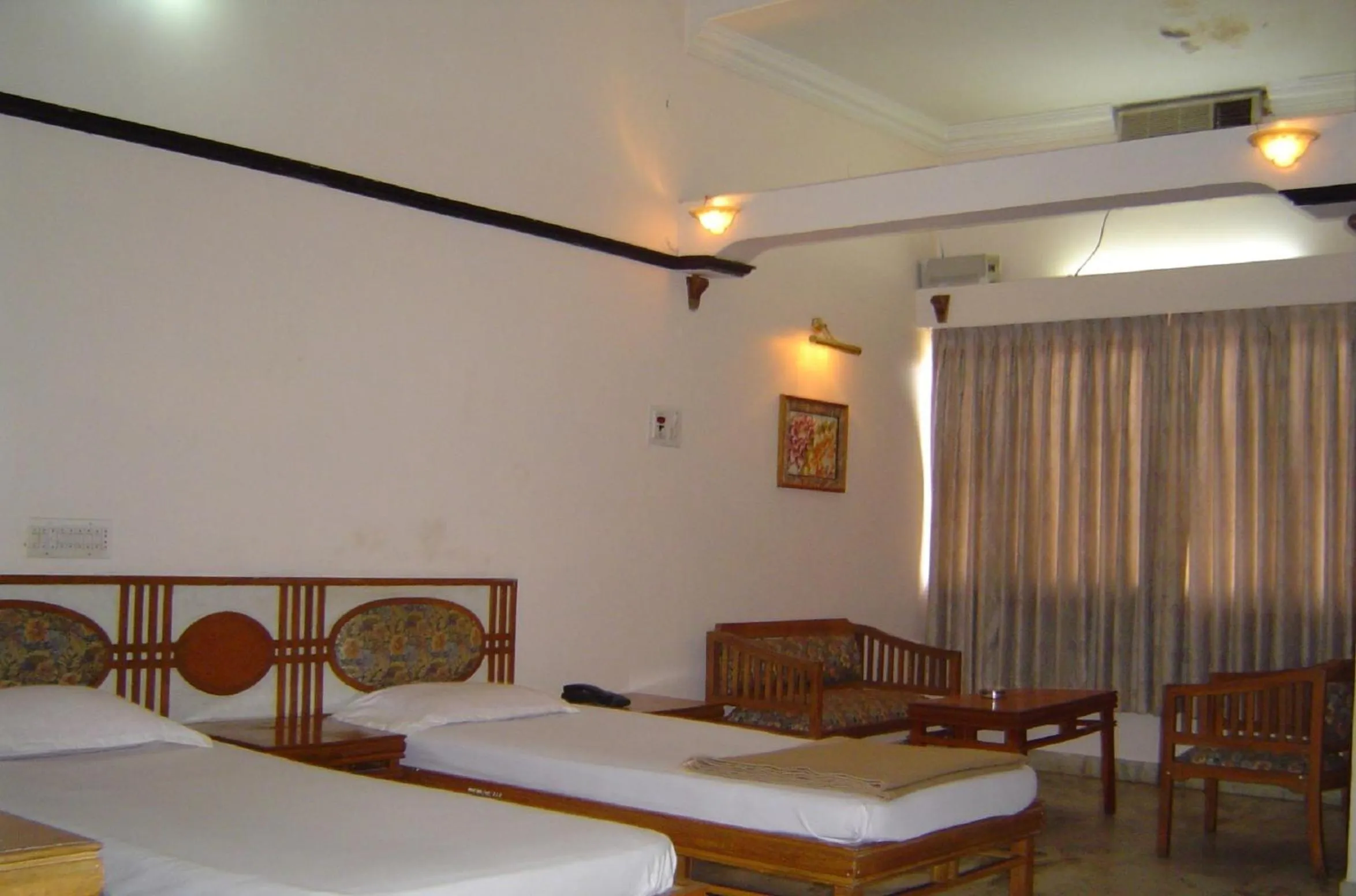 Bed in Amogha International Hotel