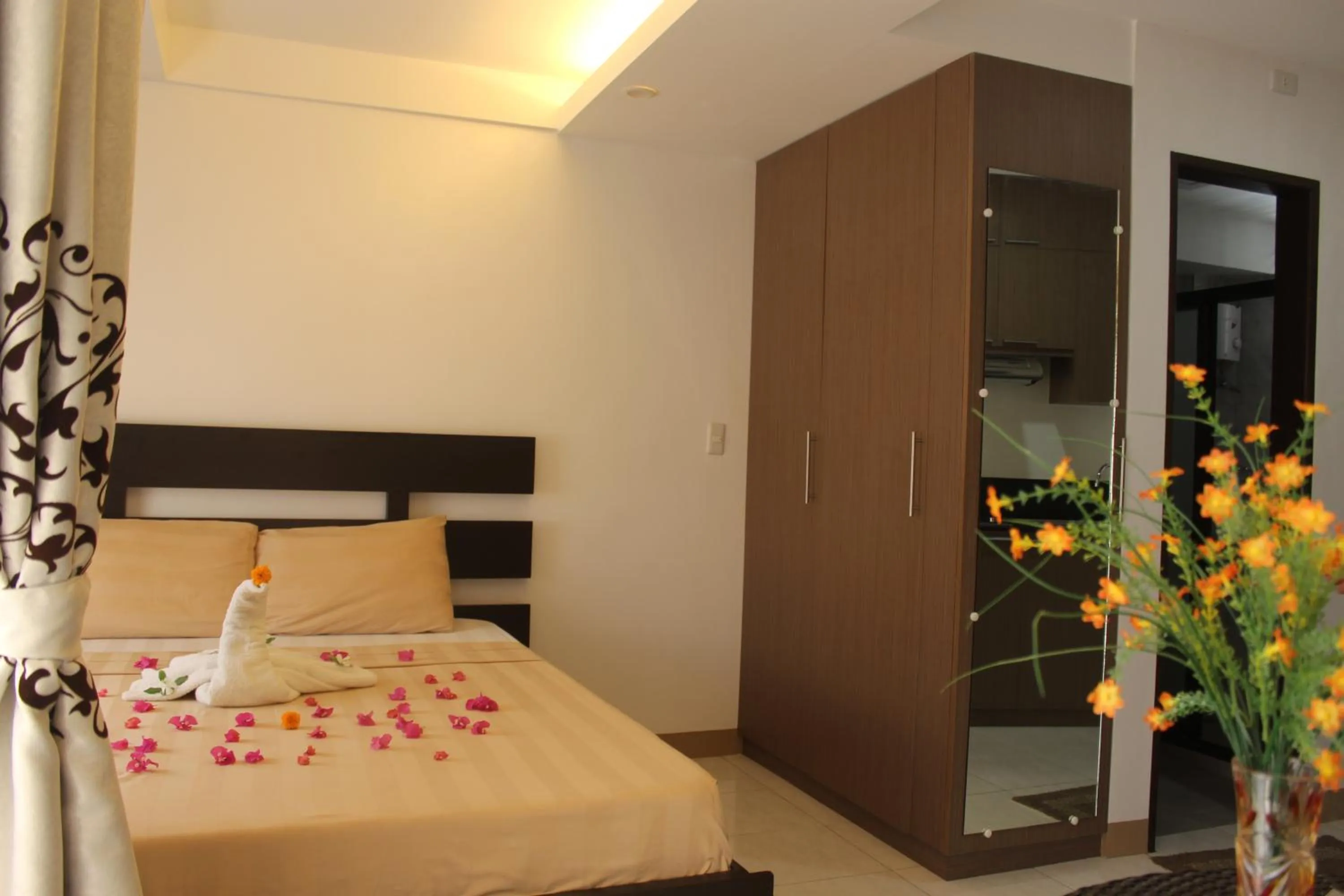 Bedroom, Bed in Anahaw Studio Suites