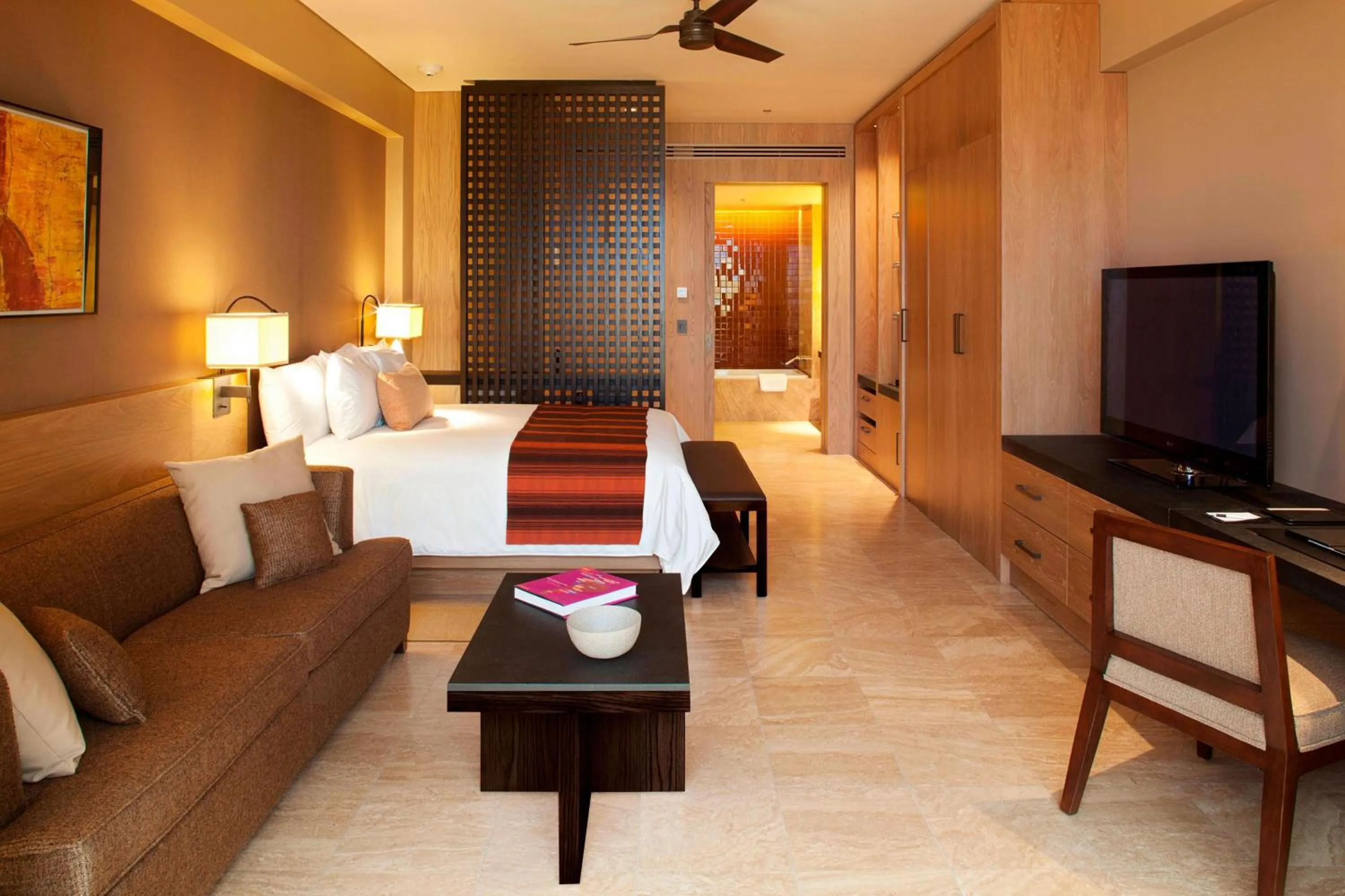 Living room, Bed in JW Marriott Los Cabos Beach Resort & Spa