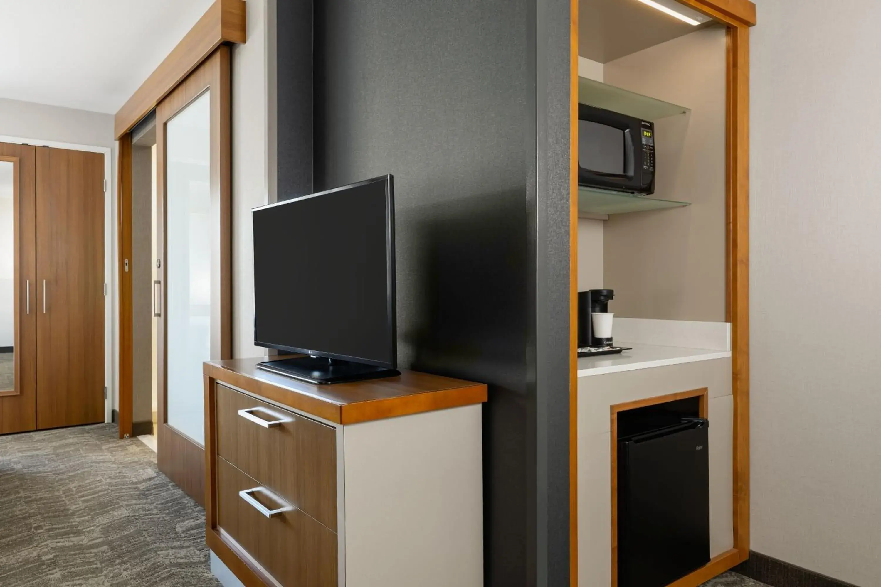 King Suite with Sofa Bed and Roll-in Shower - Mobility and Hearing Accessible in SpringHill Suites by Marriott Wisconsin Dells King Suite with Sofa Bed and Roll-in Shower - Mobility and Hearing Accessible in SpringHill Suites by Marriott Wisconsin Dells