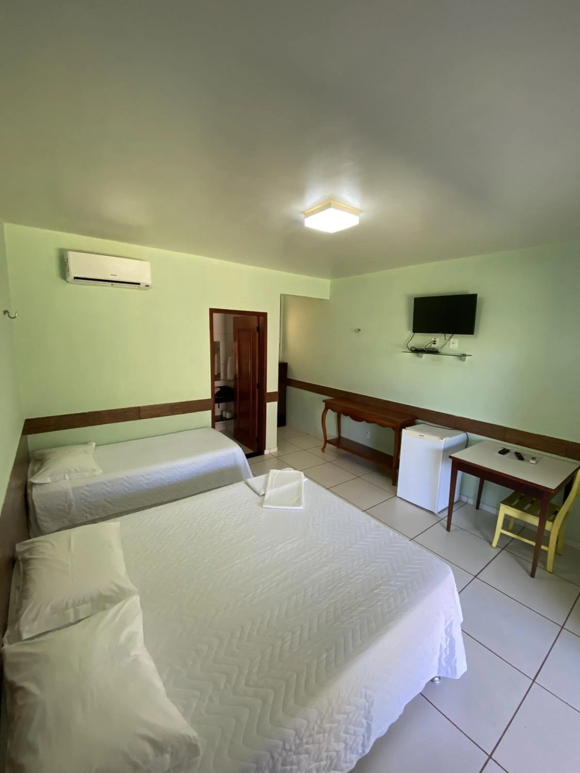 Property building, Bed in Pousada Gruta
