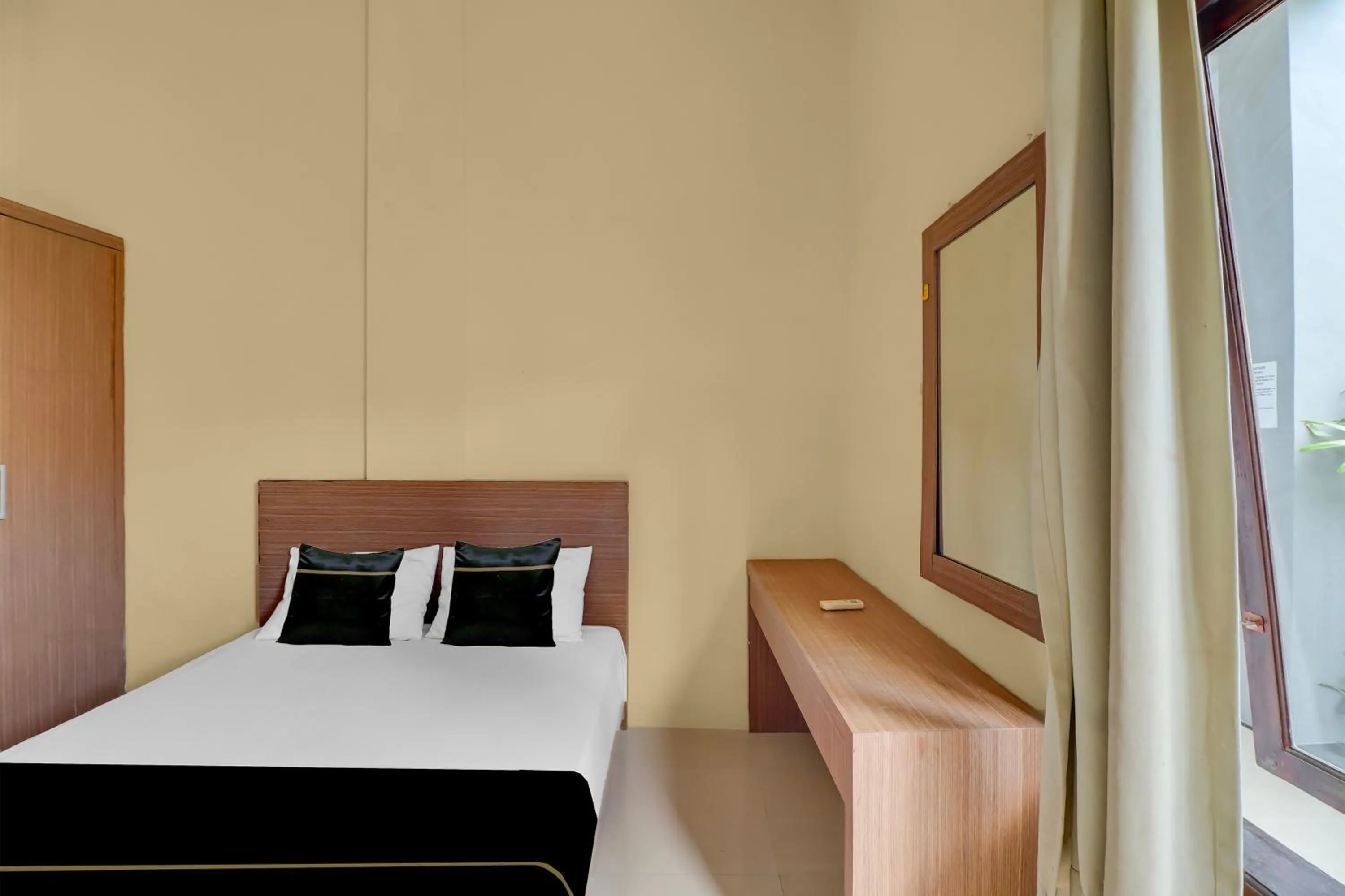 Bedroom in Hotel O near Trans Studio Theme Park formerly Cyloam Residence