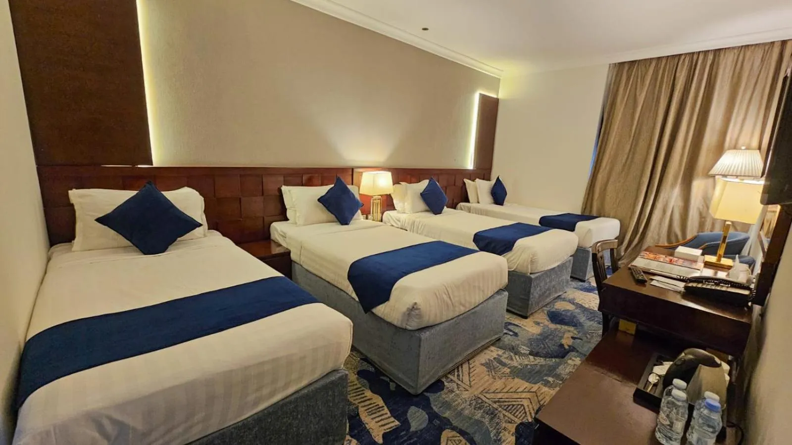 Bed in Jiwar Al Saha Hotel