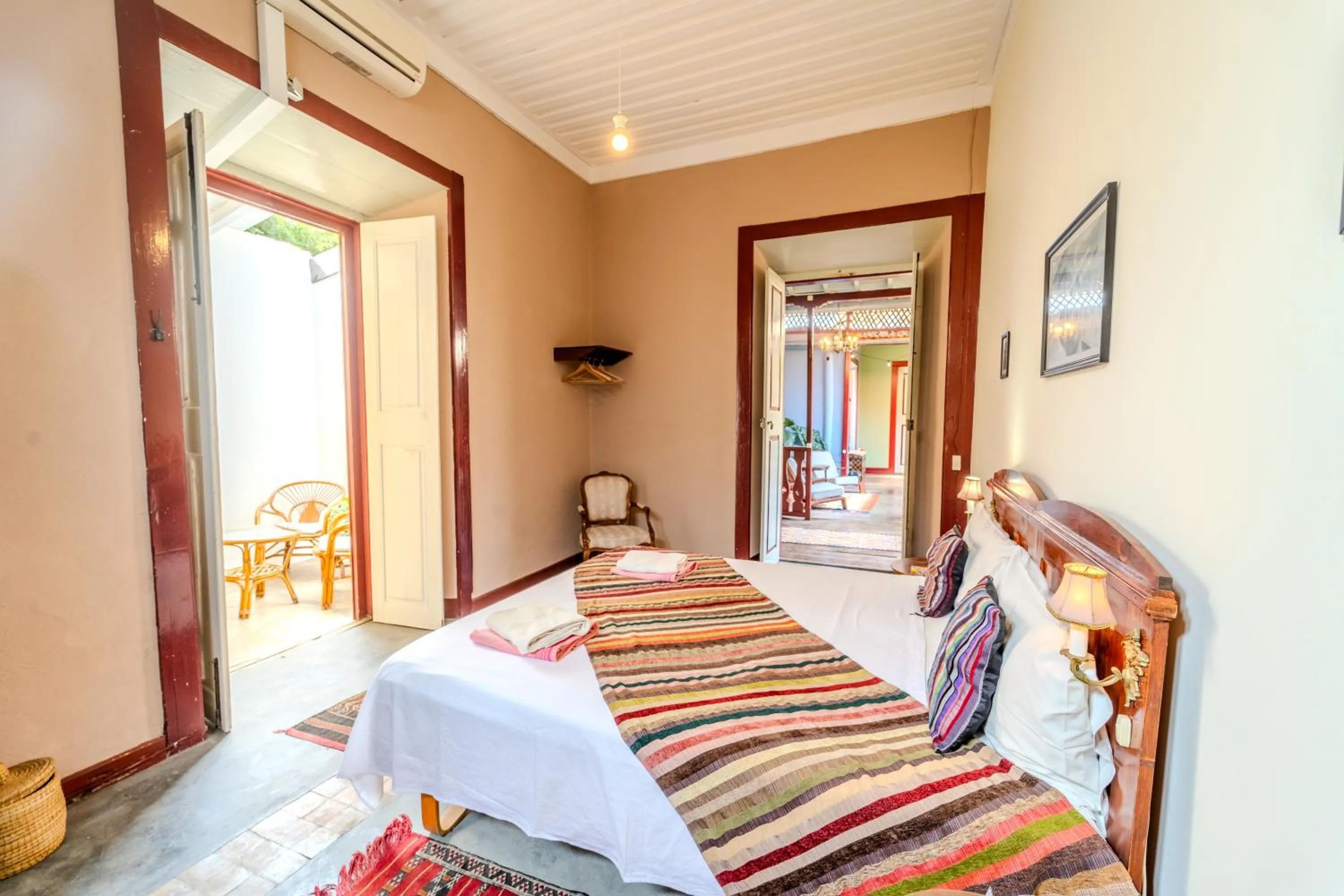 Bed in The Colonial Guest House