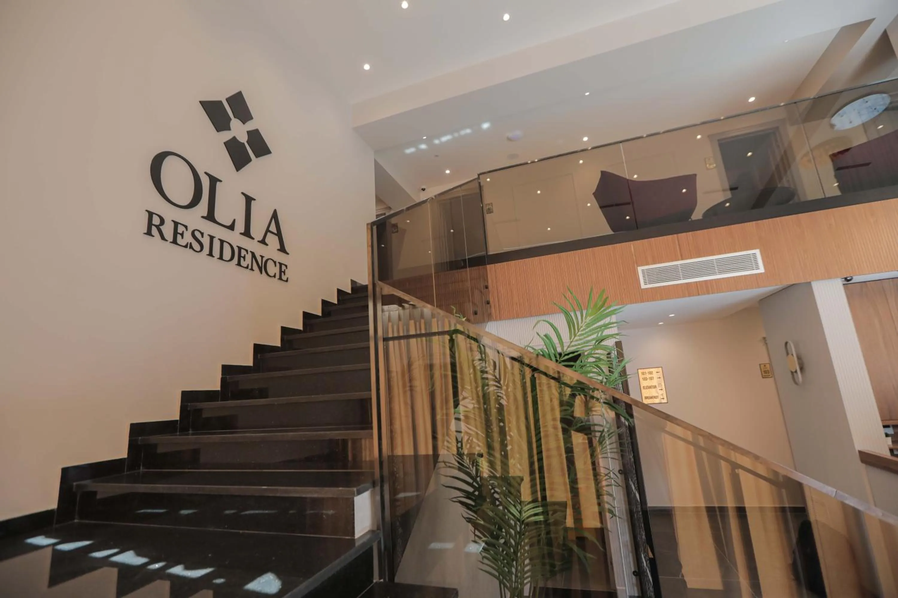 Property logo or sign in OLIA Residence