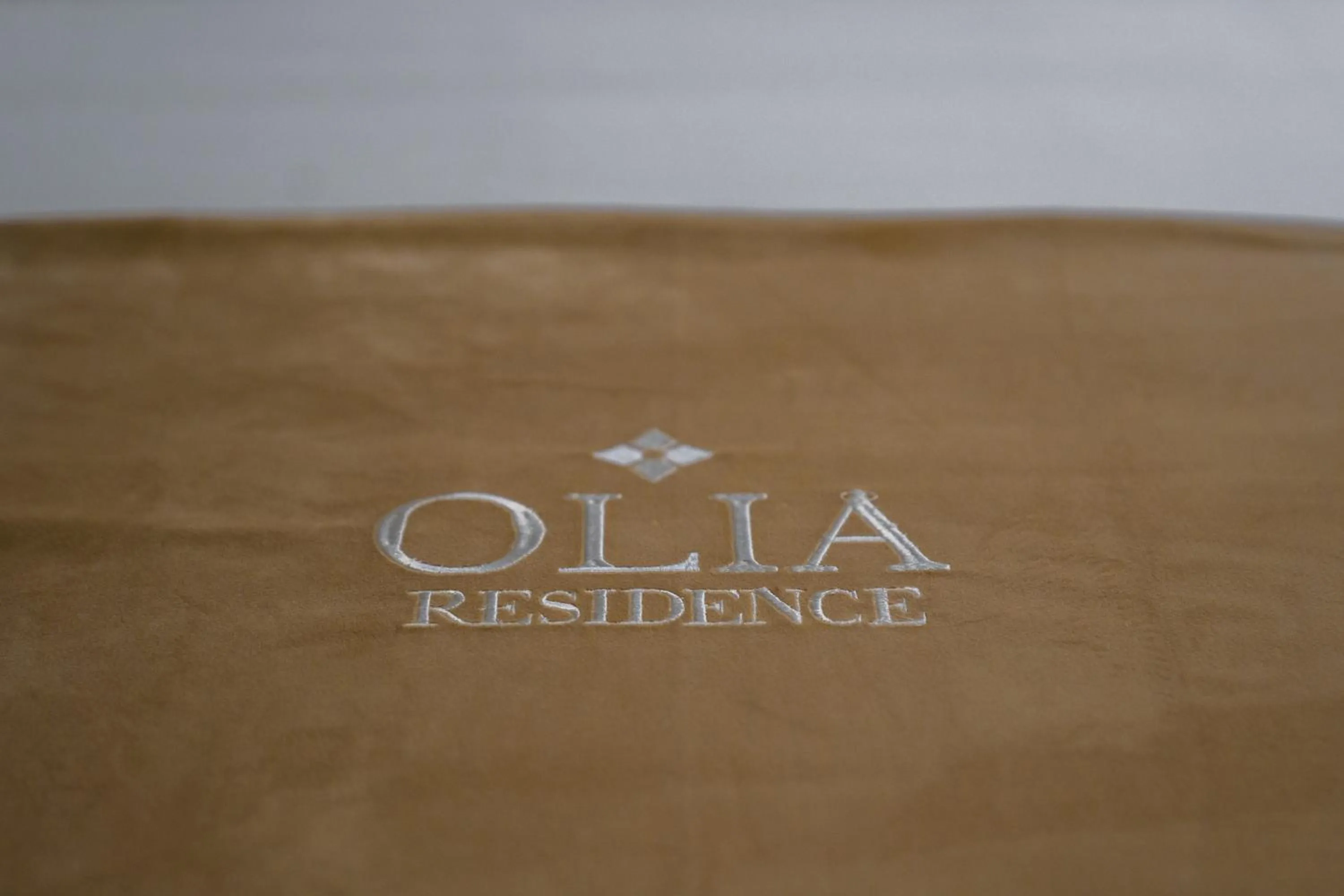 Bed in OLIA Residence