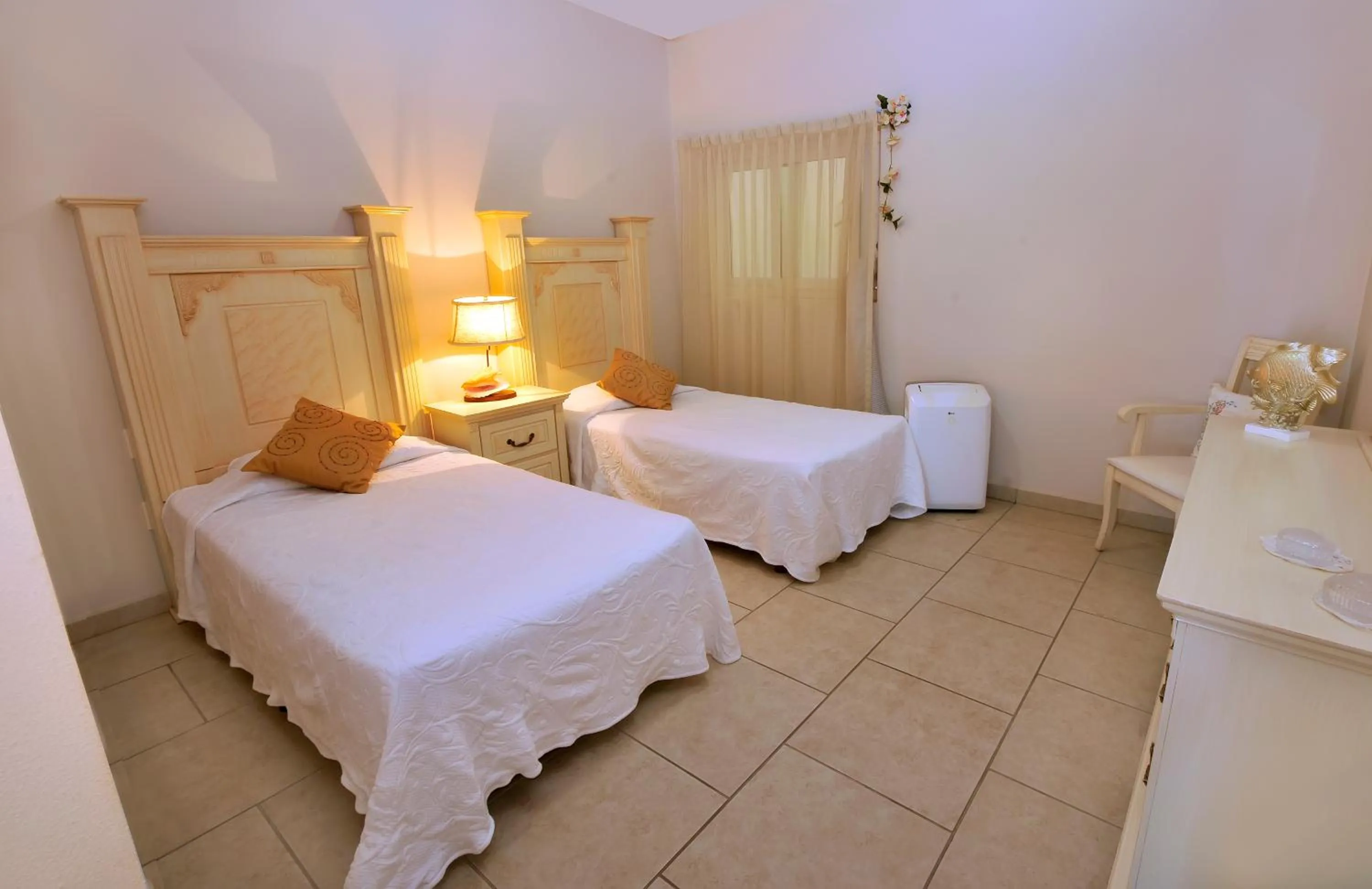 Bed in Marina Banderas Suites Hotel Boutique