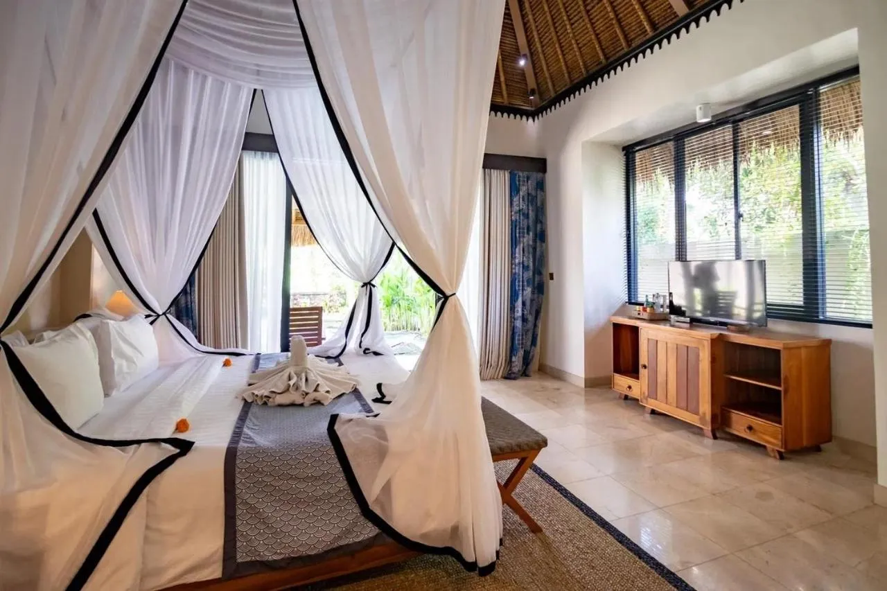 Bed in Mesari Hotel Ubud