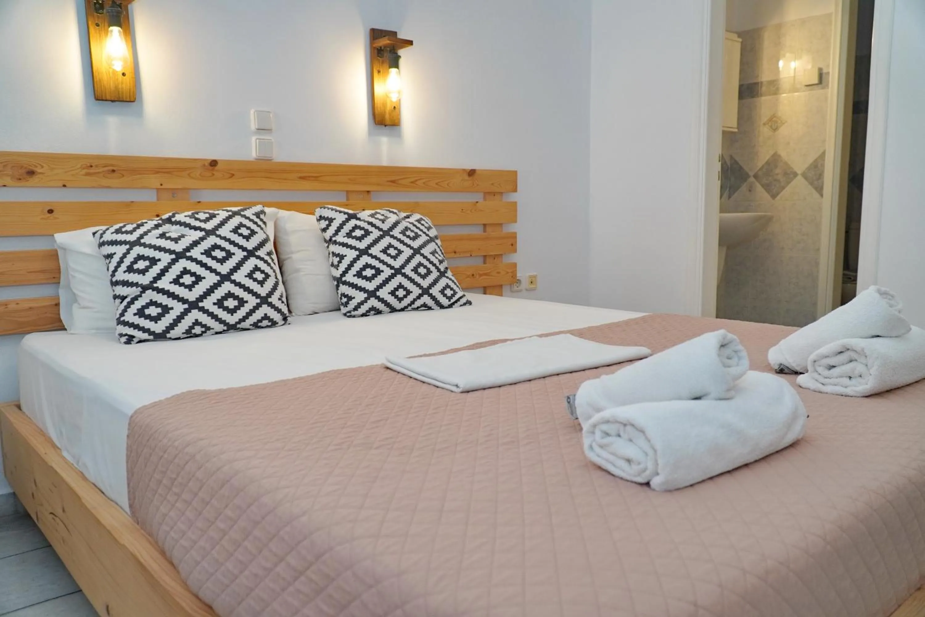Property building, Bed in Camara Hotel